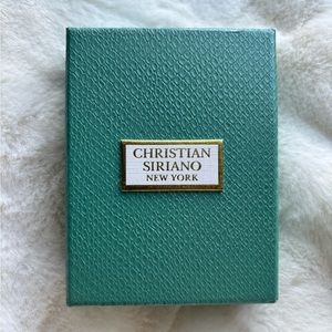 Christian Siriano gold drop earrings.